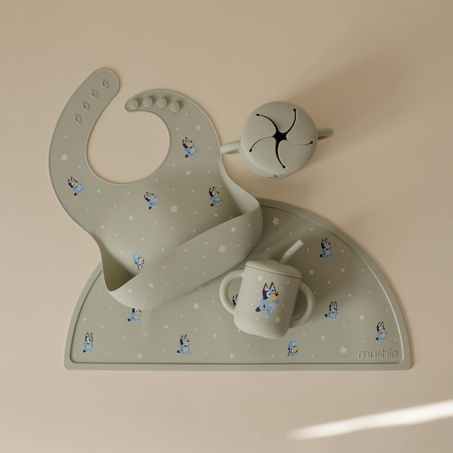 mushie x Bluey Silicone Baby Bib | Adjustable Fit Waterproof Bibs (Bluey Sage)